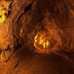 A couple stands in a lava tunnel. Photo/Submitted--Hawaii Tourism Authority/Tor Johnson